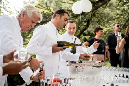 Guests celebrating at an event dinner in Tuscany