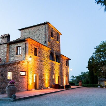 Agriturismo stone farmhouse at dusk